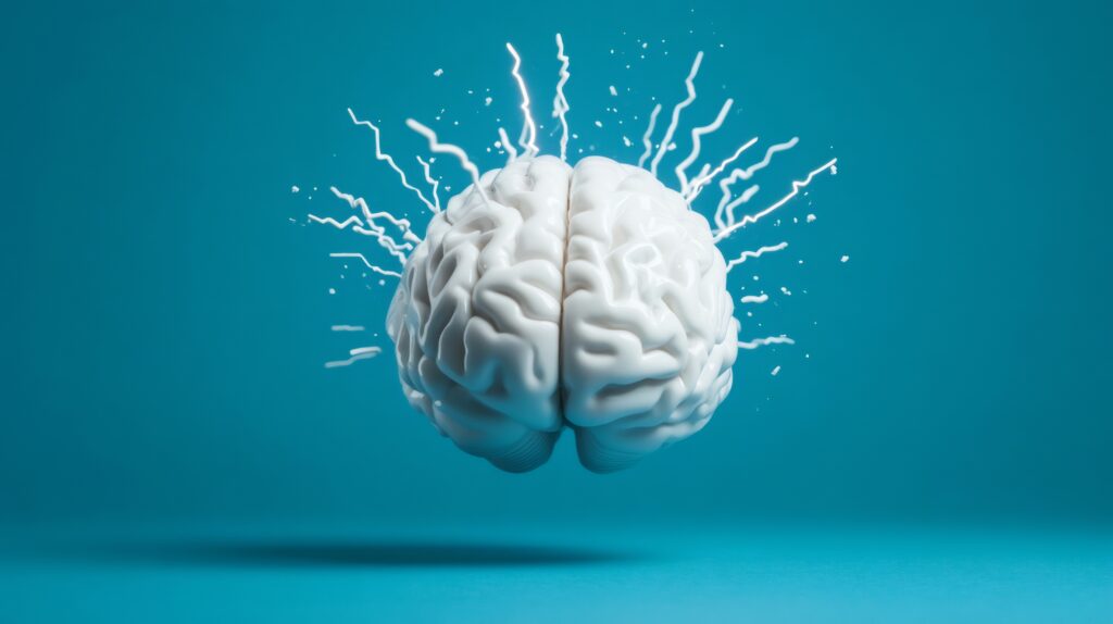 Cerebro blanco con destellos de energía sobre fondo azul, simbolizando los efectos de los latidos binaurales sobre el estrés crónico.